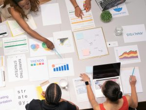 aerial view of marketing employees working together in an office